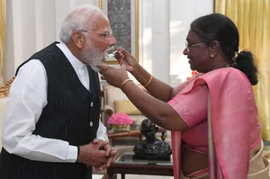 President Droupadi Murmu on Friday fed Modi 'dahi cheeni' (curd and sugar) which is considered auspicious in Indian tradition before undertaking important tasks or starting a new venture
