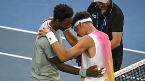 Gael Monfils embraces Ben Shelton