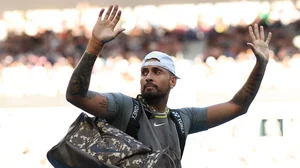 Nick Kyrgios salutes the crowd at John Cain Arena