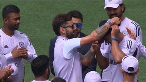 Photo: X | Johns : Nitish Kumar Reddy received Test cap from Virat Kohli in Perth.