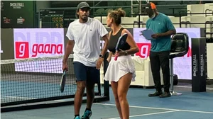 Special Arrangement : Armaan Bhatia and Roos van Reek in action on centre court in the quarter-finals of PWR DUPR India Masters Pickleball Championship.