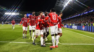 Milan celebrate Rafael Leao's goal to go 2-1 up