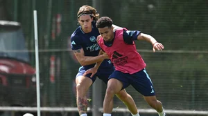 Riccardo Calafiori and Ethan Nwaneri pictured in training