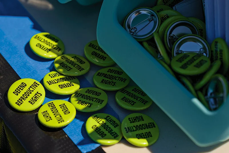 Buttons were made available to attendees during the Teens 4 Reproductive Rights meeting in Franklin