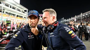 Sergio Perez and Christian Horner at the 2024 Qatar Grand Prix.