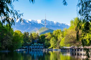 Shutterstock : View of the TV tower of the city of Almaty from the central park of culture and recreation