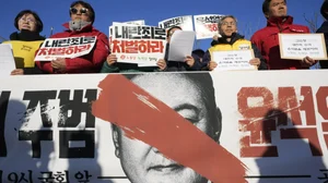 AP Photo/Ahn Young-joon : Protesters stage a rally to demand South Korean President Yoon Suk Yeol to step down in front of the National Assembly in Seoul, South Korea, Wednesday, Dec. 4, 2024. The signs read "Punish."