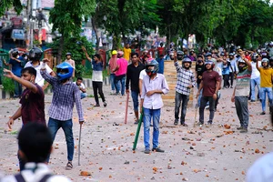 Photo: AP/Mahmud Hossain Opu : Bangladesh Campus Violence