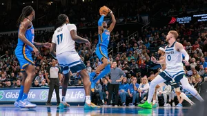 Shai Gilgeous-Alexander #2 of the Oklahoma City Thunder shoots the ball during the third quarter against the Minnesota Timberwolves at Paycom Center on December 31, 2024 in Oklahoma City, Oklahoma.