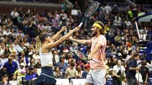 X | US Open  : Paula Badosa and Stefanso Tsitipas at the US Open mixed doubles. 
