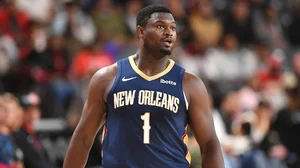 Zion Williamson takes a break during the Pelicans' win over the Magic